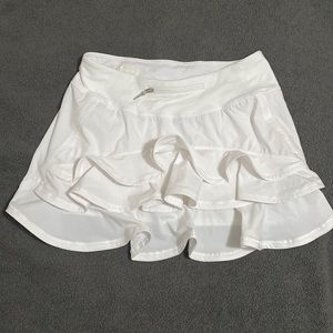 Flirtee women’s white ruffle golf skirt size medium